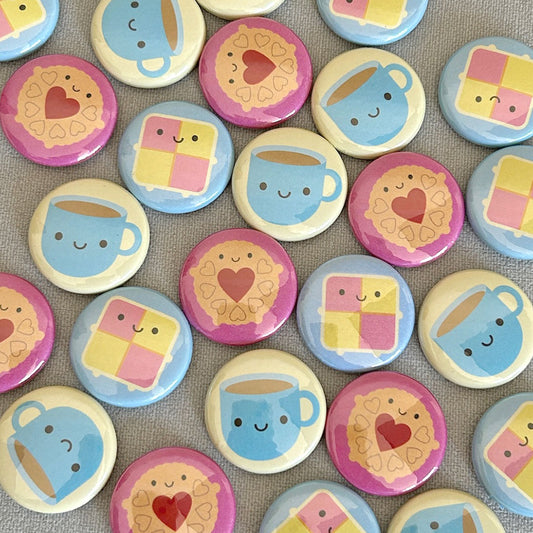 A mix of the finished badges laid out together