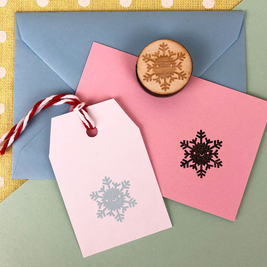 The Snowflake polymer stamp with stamped stationery and gift tag
