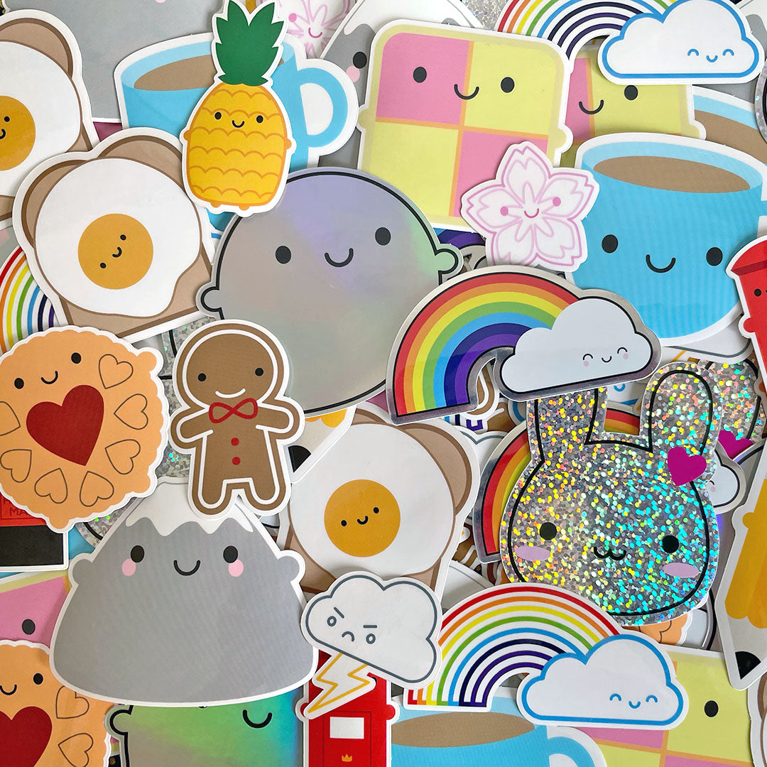 A scattered pile of all my kawaii vinyl stickers