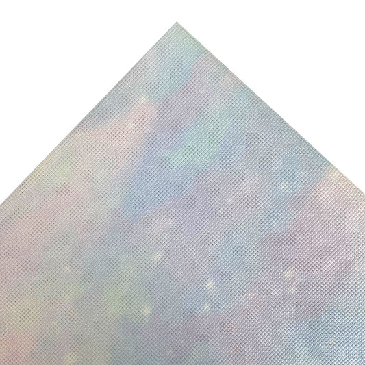 Aida fabric digitally printed with a dreamy wash of pastel colours and white stars