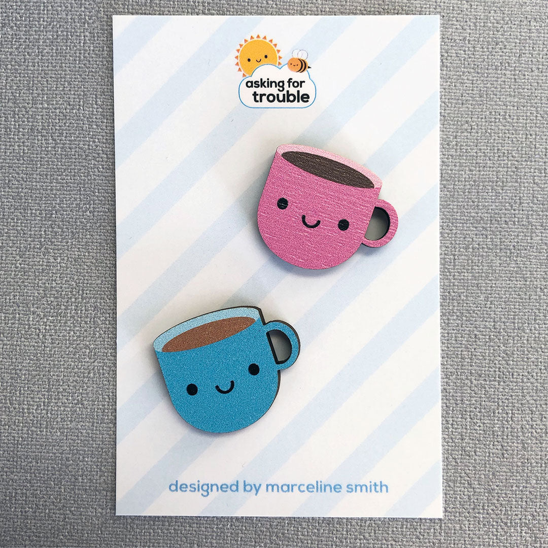 Pink & Blue Cups packaged on an illustrated backing card