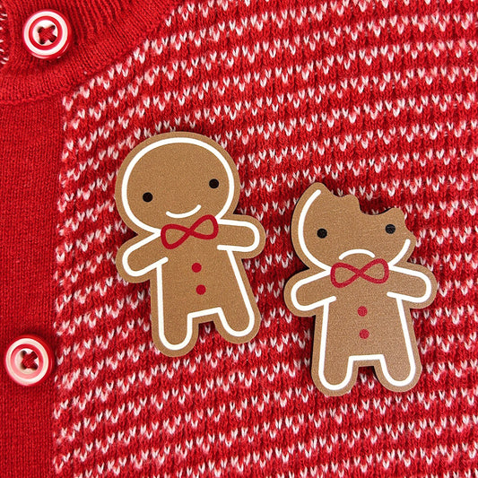 A set of 2 kawaii Gingerbread Man brooches made from ethically sourced, FSC certified wood