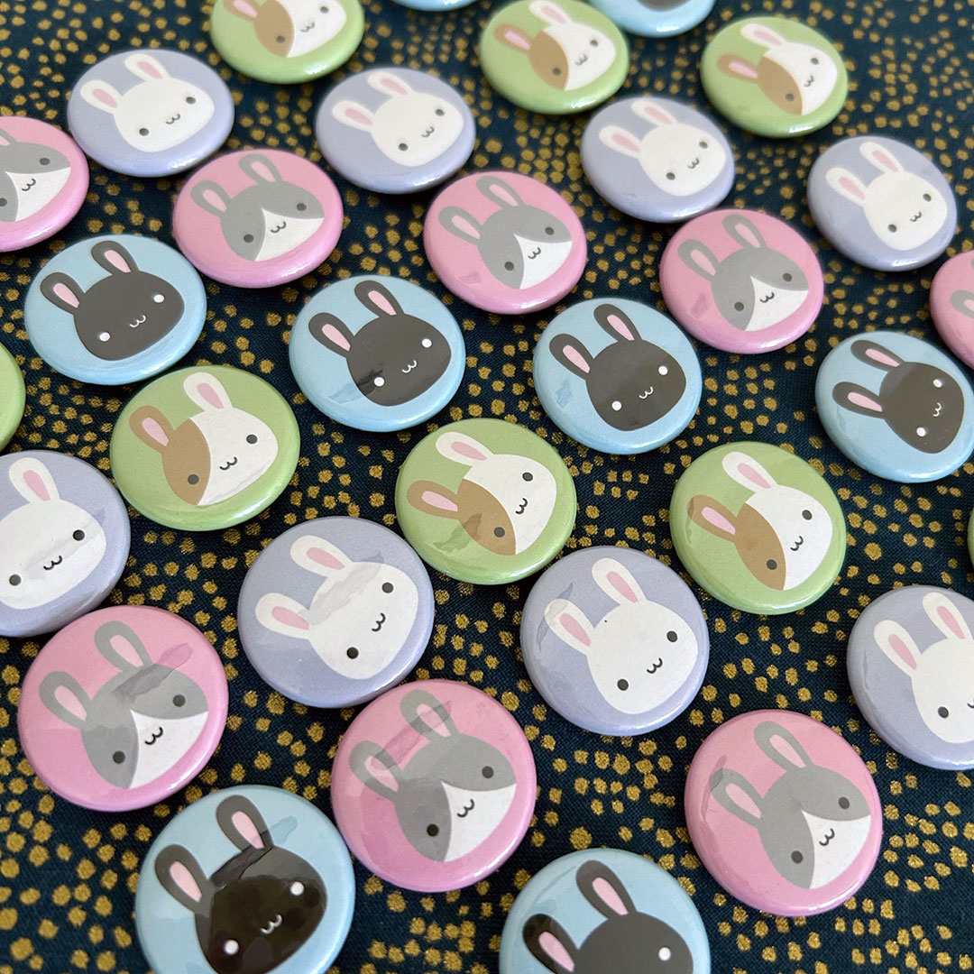 A mix of the finished bunny badges laid out together