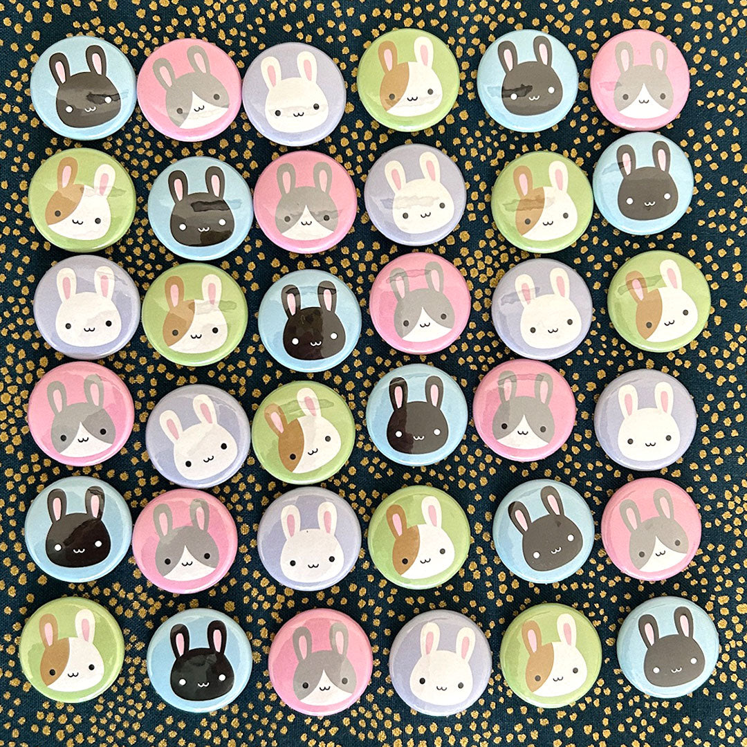 A mix of the finished bunny badges laid out together