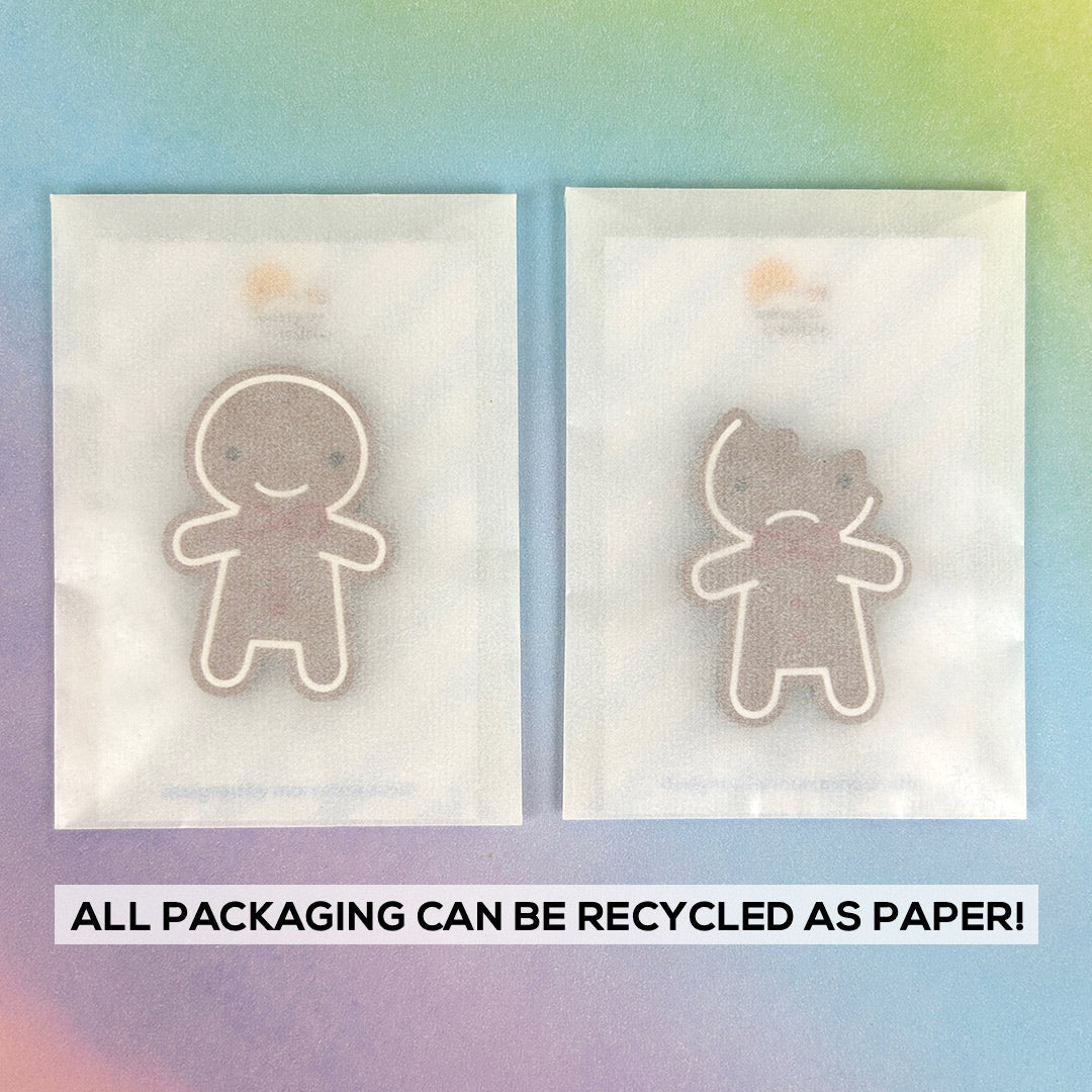 Brooches/pins are packaged in a translucent glassine bag that can be recycled as paper