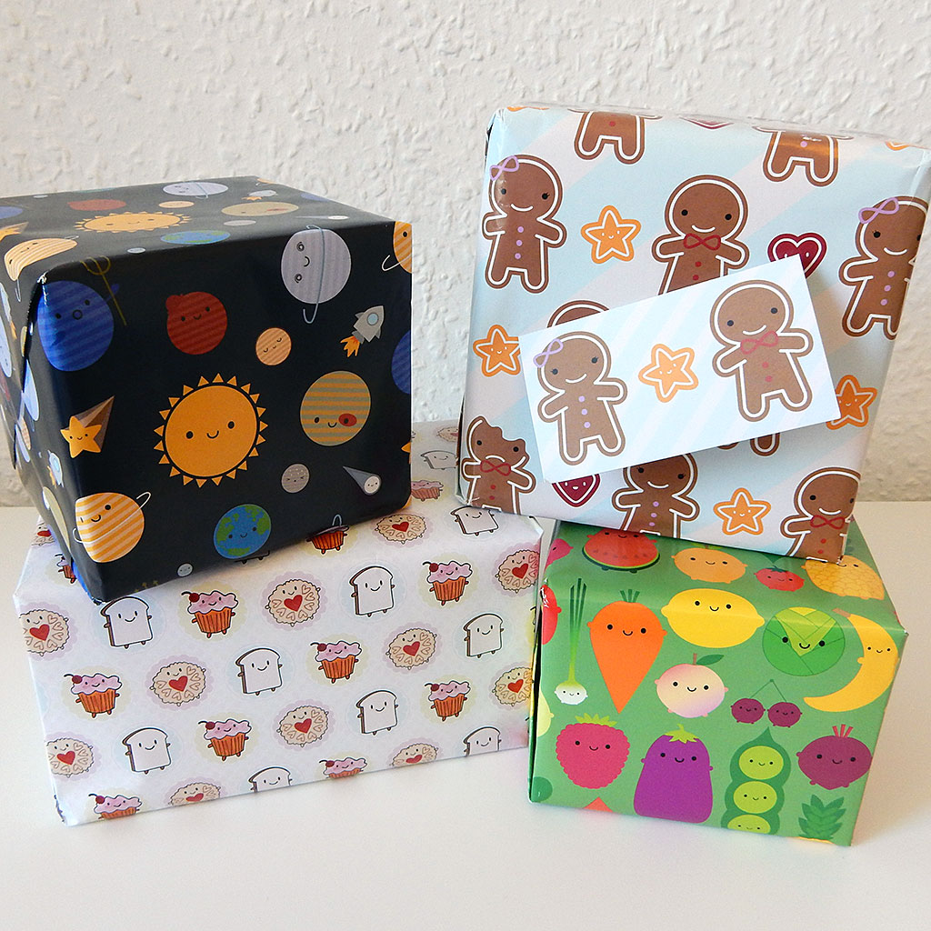Wide view of four wrapped parcels with matching cute gift tags attached