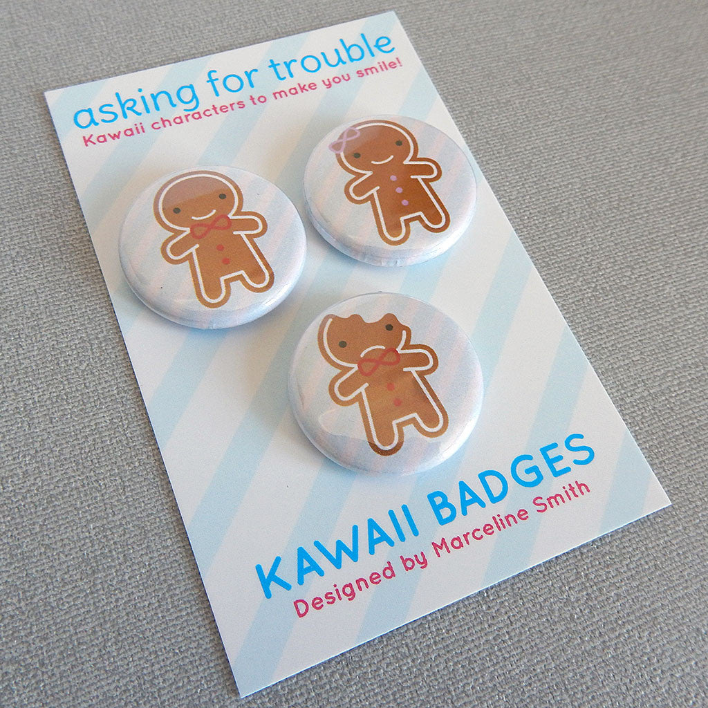 Badges are packaged on a striped backing card