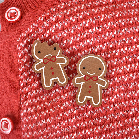 A set of 2 kawaii Gingerbread Man brooches made from ethically sourced, FSC certified wood
