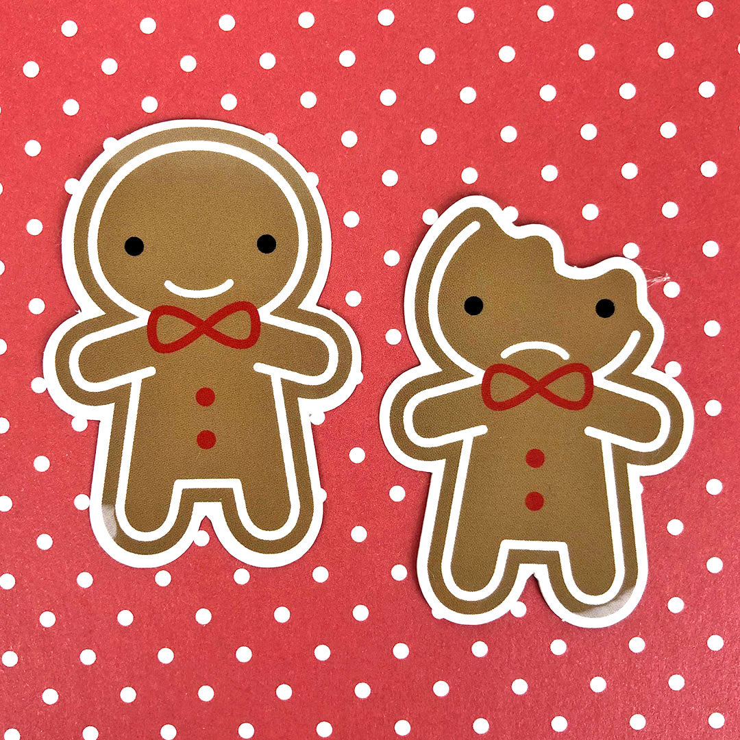 The happy gingerbread man and sad bitten gingerbread man stickers together