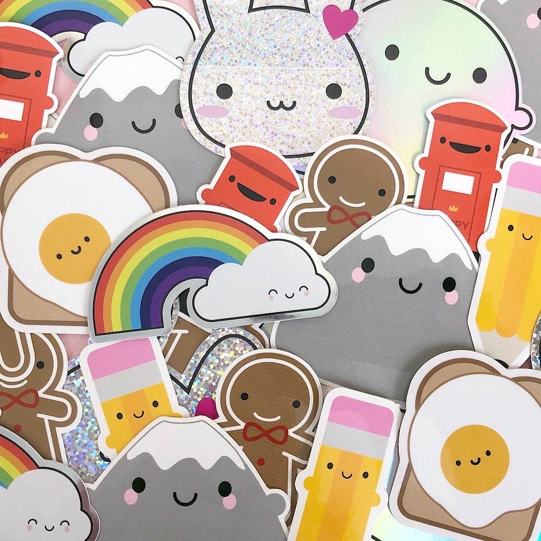 A scattered pile of all my kawaii vinyl stickers