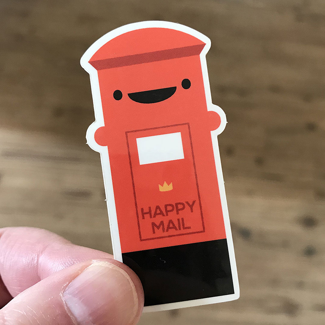 A die cut vinyl sticker of a happy Postbox