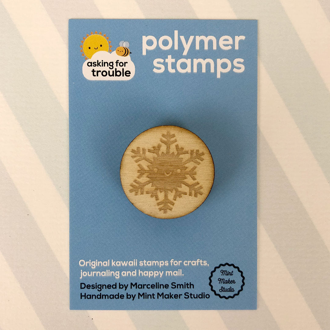 The polymer stamp on an illustrated backing card