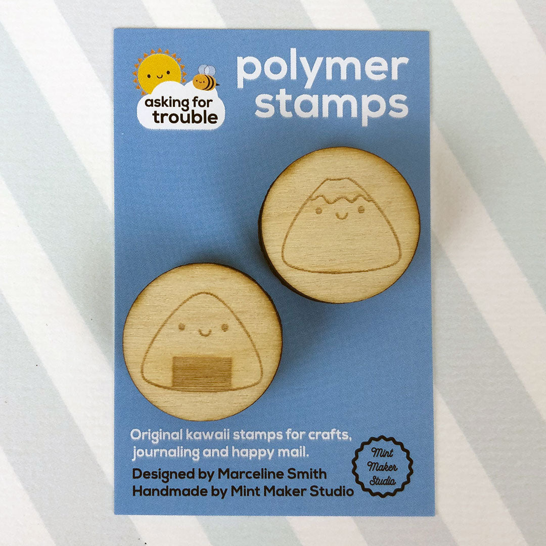 The 2 stamps together on an illustrated backing card