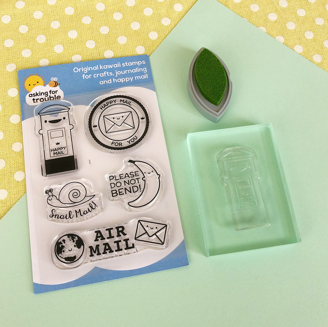A stamp set, a stamp attached to a clear block and an ink pad
