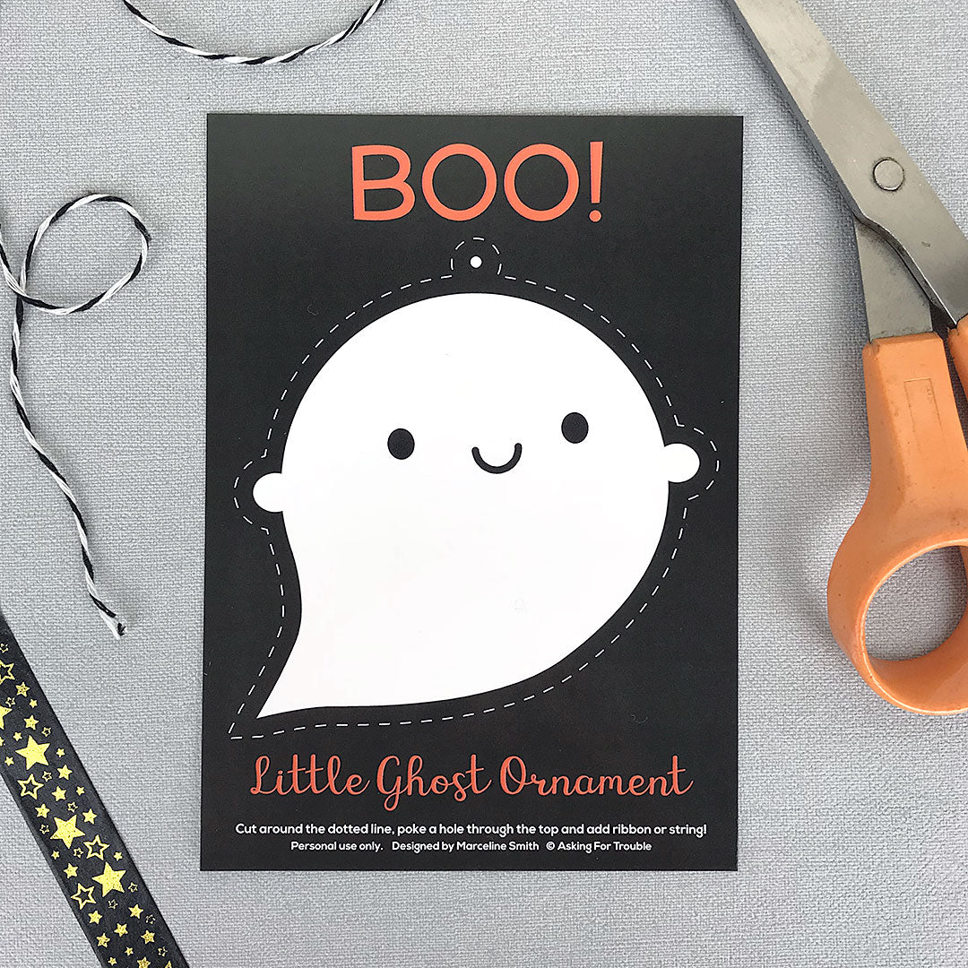 An illustrated card with a happy ghost that can be cut out