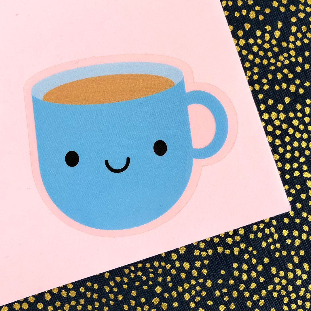 A cup of tea sticker displayed on an envelope to show the clear border