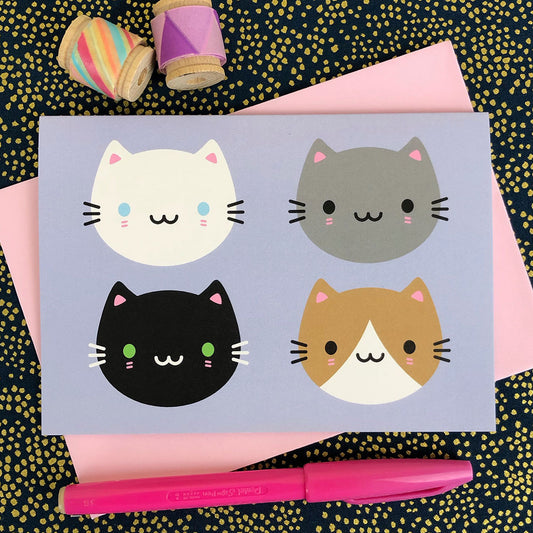 An illustrated card with a 4 happy cats in different colours or breeds