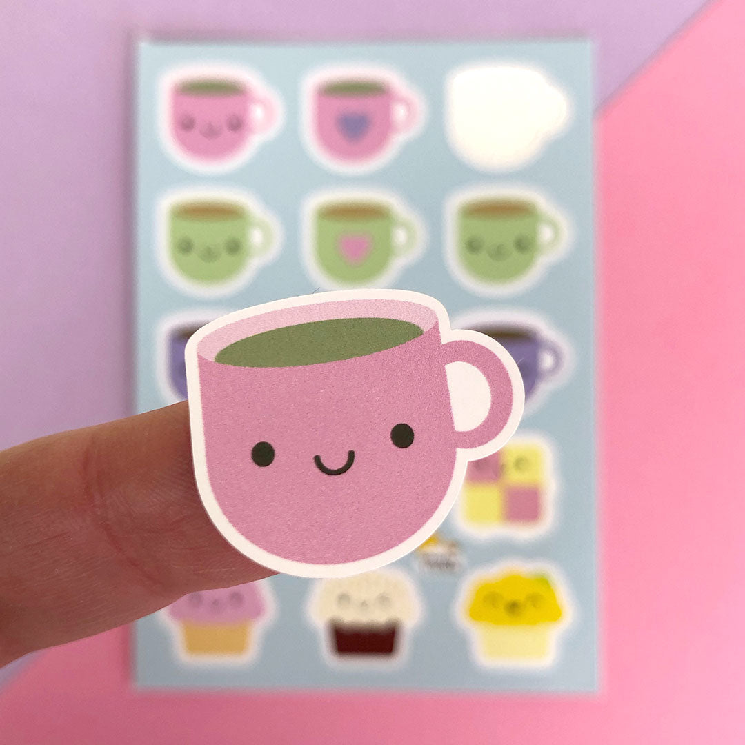 A close up of a die cut Cup of Tea sticker