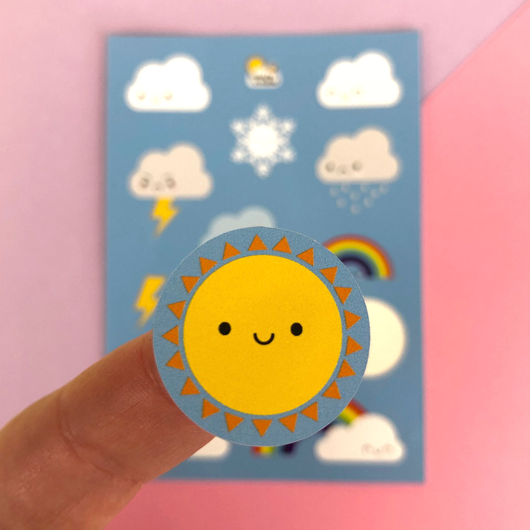 A close up of a die cut Sun sticker