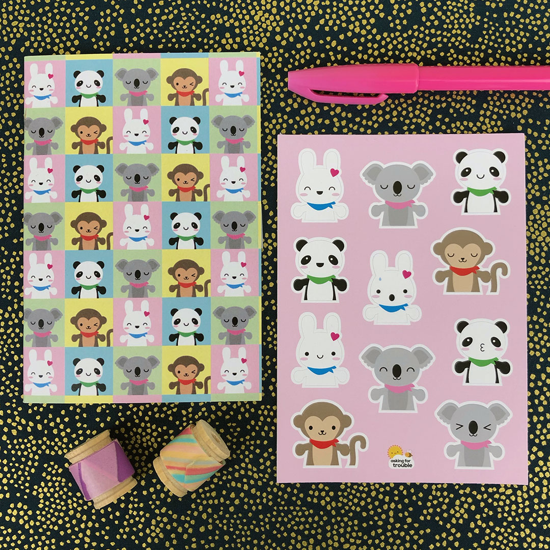 The SCK Mascots notebook and matching sticker set