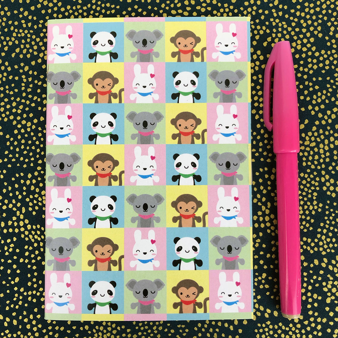 The cover has a repeat pattern of the kawaii mascots - Bunny, Panda, Koala & Monkey