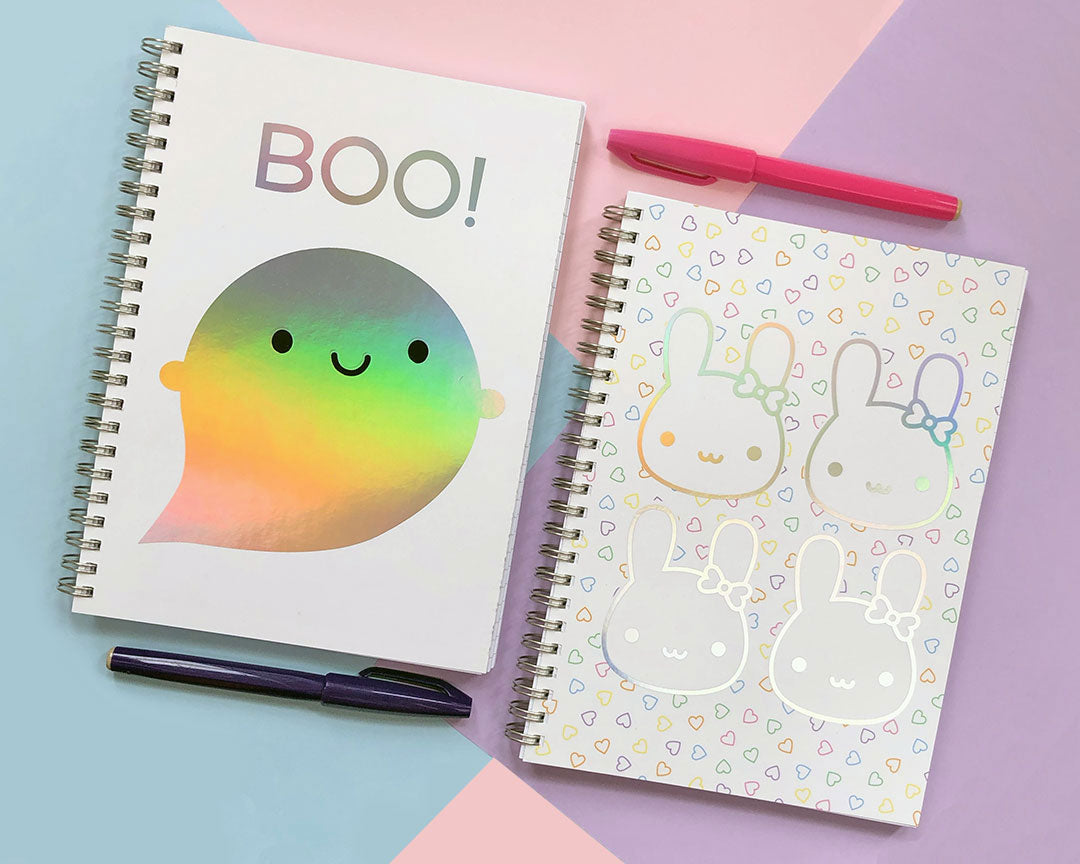 Rainbow foil Ghost & Bunny notebooks displayed together