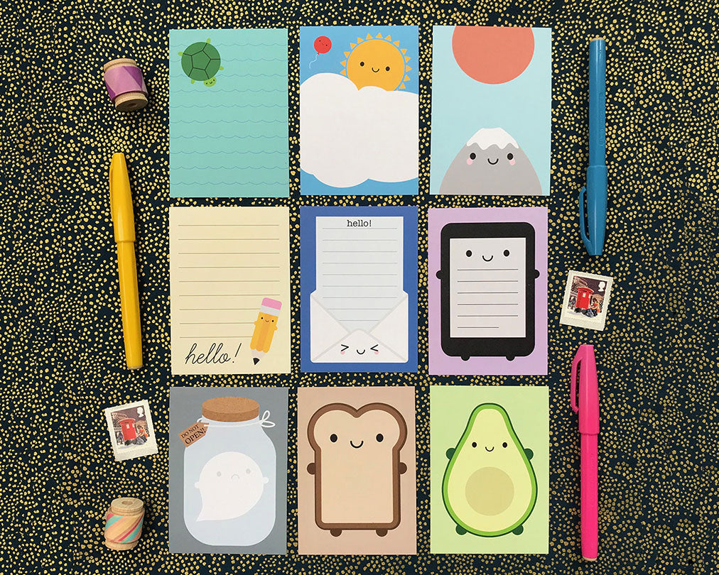 All 9 mini memo sheets laid out in a square with pens, stamps and washi tape