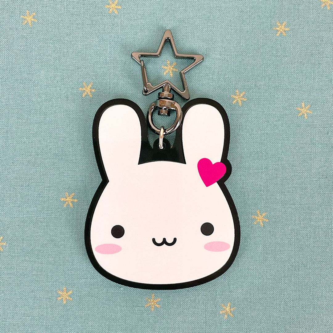 A kawaii bunny shaped keyring with full colour print and star keychain