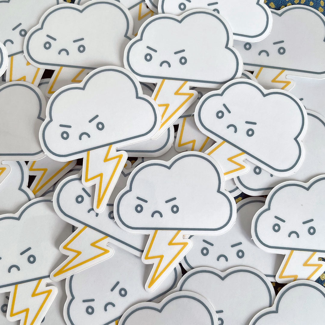 A scattered pile of Thunder Cloud stickers