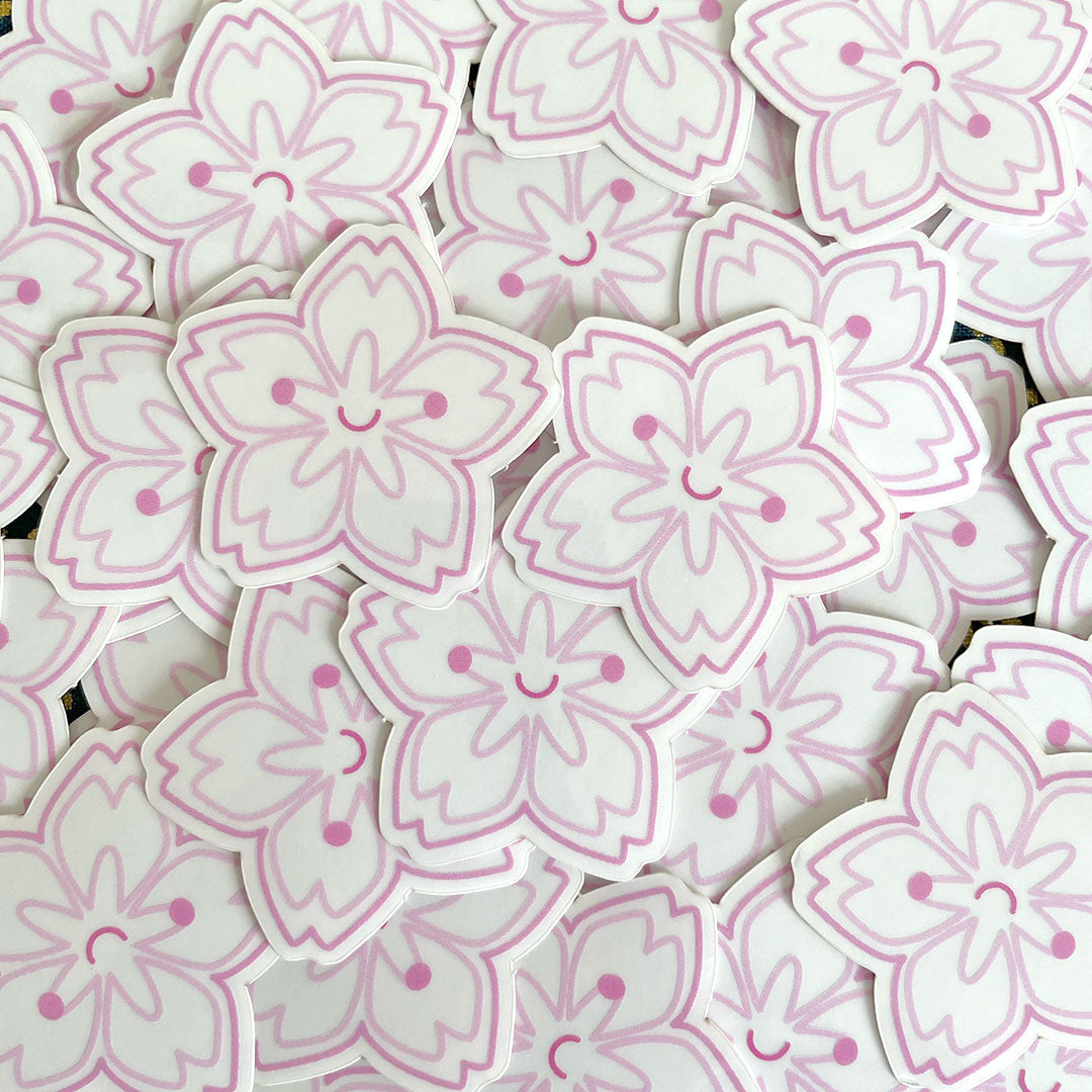 A scattered pile of Sakura stickers