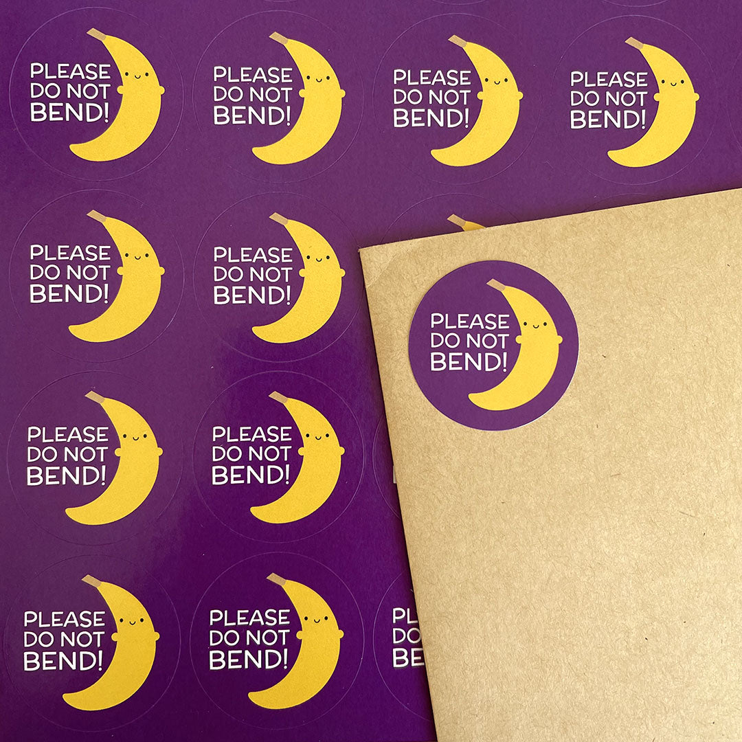 A sheet of Do Not Bend stickers and one on an envelope