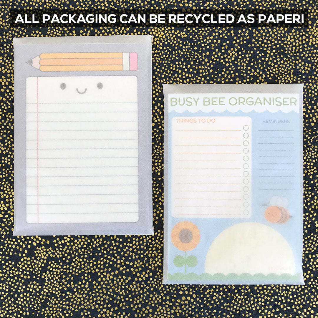 Notepads packaged in translucent glassine bags that can be recycled as paper