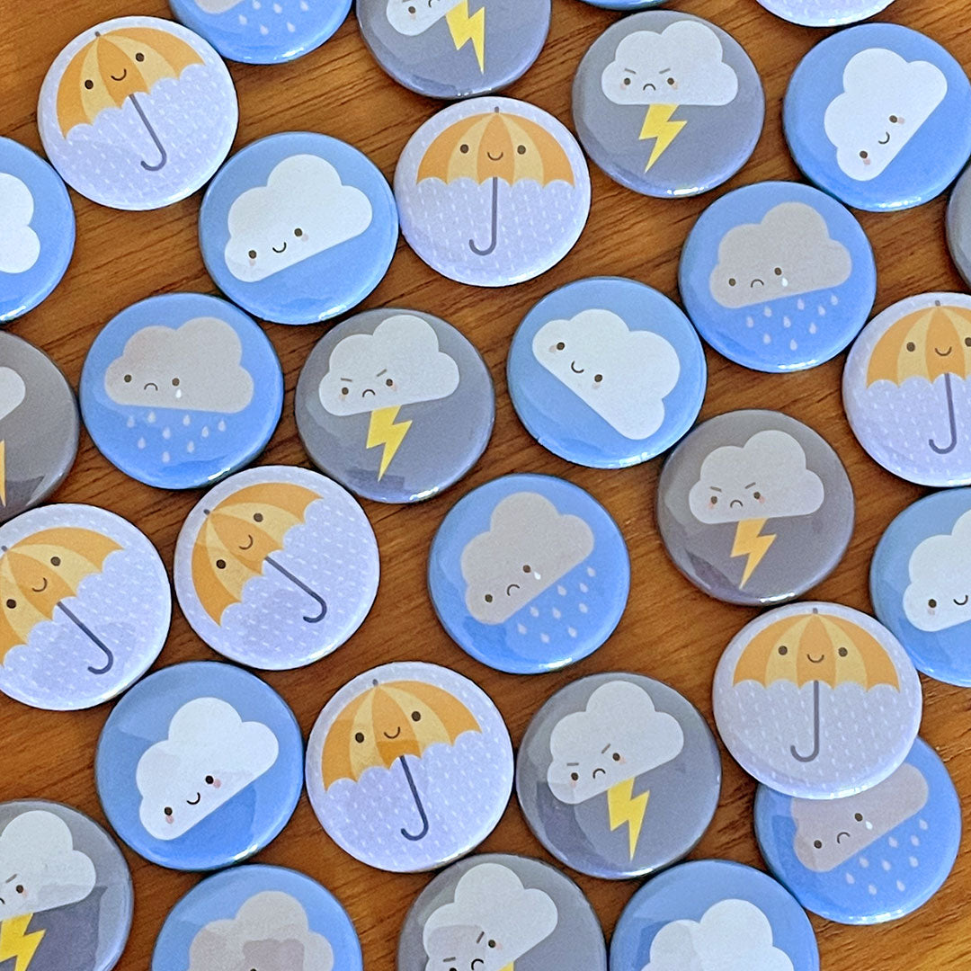 A mix of the finished Kawaii Skies badges laid out together