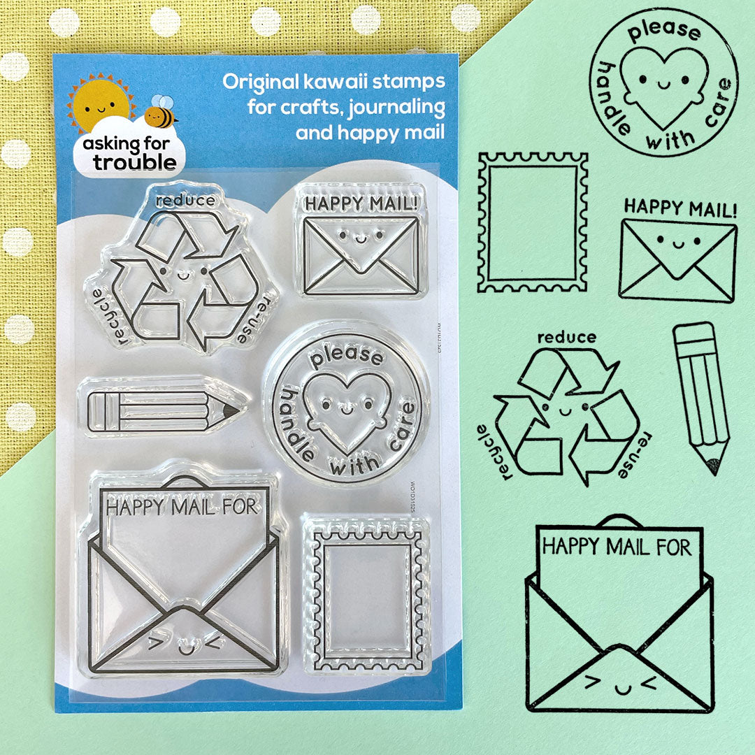 The packaged Happy Mail (extras) stamp set and how all 6 designs look when stamped with ink