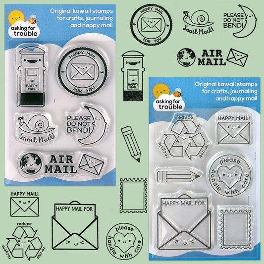 Both packaged Happy Mail stamp sets and how all 11 designs look when stamped with ink