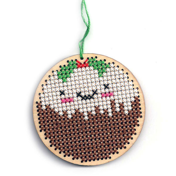 A finished Christmas Pudding cross stitch ornament, stitched on a wooden blank (no longer available)